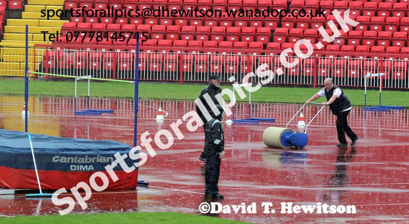 In terrible conditions trying to keep the high jump area dry was extremely difficult, British National League, Division 1, Gateshead. Photo: David T. Hewitson/Sports for All Pics